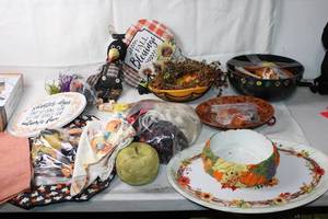 lot 396 image: Autumn Decorative Set with Plates, Wreath, and Fall-Themed Decor