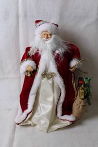 lot 410 image: Vintage Santa Claus Figurine with Plush Coat and Gift Bag