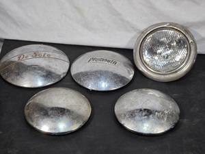 lot 10 image: Lot of Vintage Hubcaps feature brands such as De Soto and others