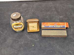 lot 27 image: Lot of Vintage Items Yankee Clipper Oil Stone, Phinney-Walker Alarm Clock, Sanka Jar with Contents