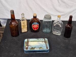 lot 35 image: Lot of Vintage Bottles and Tins including a a Mr. Boston bottle and a Mason jar