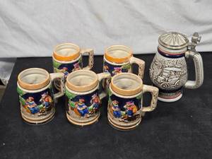 lot 44 image: Avon Ceramic Steins and Mugs with 1911 Ford Model-T Design
