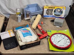 lot 108 image: Home Improvement and Maintenance Items including polishing cloths, a CDDVD visor organizer, and various painting supplies such as a roller and bucket.