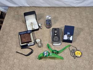 lot 117 image: Lot of Watches, Wallet, and Accessories