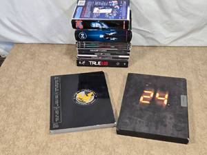 lot 138 image: Lot of DVDs and Books from TV Series 24, House of Cards, and True Blood