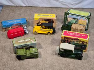 lot 83 image: Lot of Avon After Shave Bottles Shaped as Vehicles