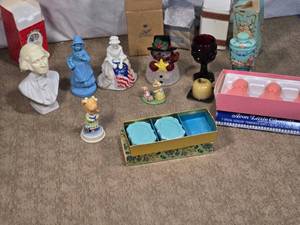 lot 85 image: Assortment of Decorative Avon Figurines, Soaps, and Vintage Items