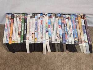 lot 152 image: DVDs including Popular Movies and Comedies like Bridget Jones The Edge of Reason, When Harry Met Sally, Sleepless in Seattle, and Dirty Dancing.