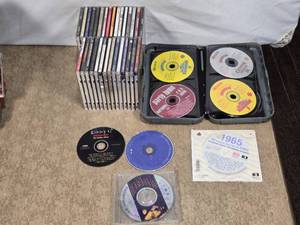 lot 159 image: Assortment of Music CDs and Karaoke Discs