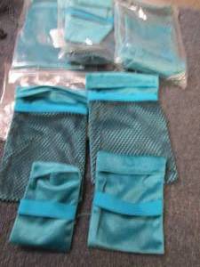 lot 34 image: 4- 4 pc Sand Remover Pouches for Be...