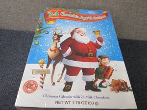 lot 78 image: Stack of Milk Chocolate Christmas C...