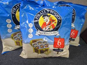 lot 234 image: 3- 6 (1 oz) bags Pirates Booty Aged...