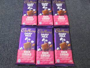 lot 273 image: 6- 3.5 oz Cadbury Dairy Milk Rock t...