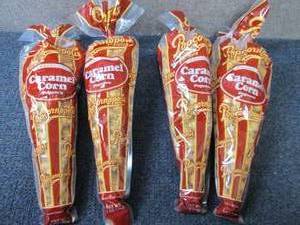 lot 346 image: 4- 7oz Popcornopolis Caramel Corn...