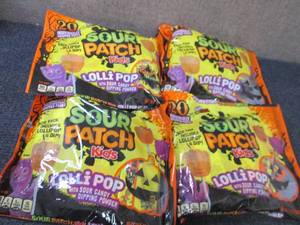lot 409 image: 4- 10.58 Sour Patch Kids Lollipops...