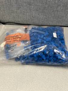 lot 17 image: Bag Of Blue Caps With Plastic Tubes - See Photos