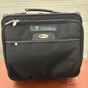 lot 68 image: MSRP $100 High Quality Targus Xltek Wheeled Instrument Travel Padded Laptop Bag Rolling Case Carryon Luggage  Multiple Compartments for Organization  Adjustable Handle for Easy Mobility  Like New Condition