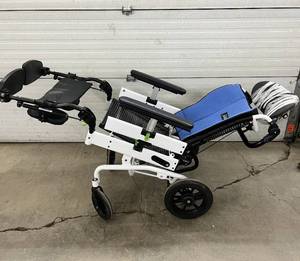 lot 36 image: MSRP $4000 Ormesa Juditta Tilt-In-Space Comfort Wheelchair  Tilting & Reclining Features for Enhanced Comfort  Viscoelastic Seat Cords Prevent Pressure Sores Shape Guarantees Breathability, Hygiene, and Comfort Good Working Condition