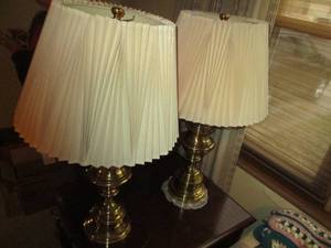 lot 24 image: Pair of very heavy brass-tone table...