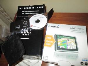lot 41 image: The Sharper Image mini portable cam...