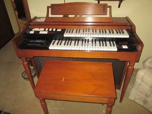 lot 45 image: Vintage wood encased Electric organ...