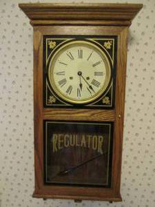 lot 82 image: Wood framed pendulum style Regulato...