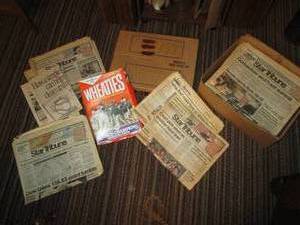 lot 115 image: Box of Newspapers in regards to the...