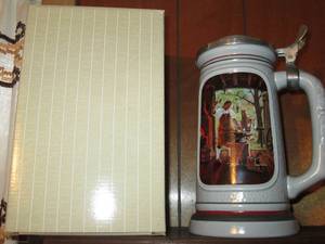 lot 151 image: Avon collector stein Village Black...