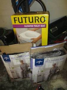 lot 229 image: Futuro Elevated toilet seat and bed...