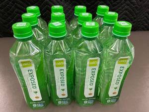 lot 40 image: Set of 12 ALO Exposed Aloe Vera Juice Drinks
