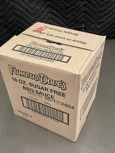 lot 131 image: Case of 6 Famous Daves 18 oz. Sugar Free BBQ Sauce