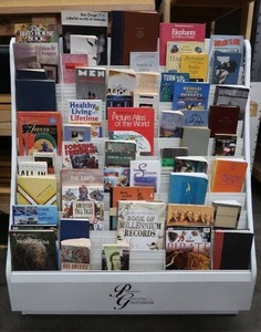 lot 16 image: GREETING CARD DISPLAY RACK PLUS BOOKS