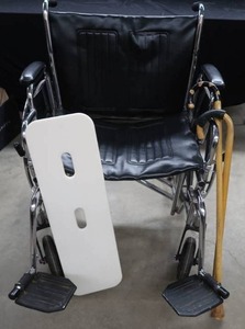 lot 27 image: EXTRA LARGE WHEEL CHAIR, 2 CANES, AND BOARD