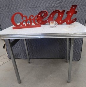 lot 30 image: VINTAGE TABLE AND SIGNAGE