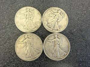 lot 27 image: 4 1945 Walking Liberty Half Dollars