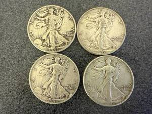 lot 29 image: 4 1942 Walking Liberty Half Dollars