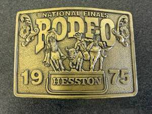 lot 31 image: 1975 Hesston National Finals Rodeo Belt Buckle