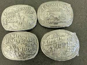 lot 41 image: 1992, 1993, 1994 & 1995 Hesston National Finals Rodeo Belt Buckles