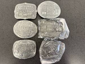 lot 50 image: 1999-2004 Hesston National Finals Rodeo Belt Buckles