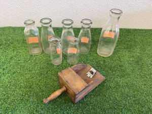 lot 69 image: Vintage Wooden ScoopBottle Opener & Glass Milk Bottles