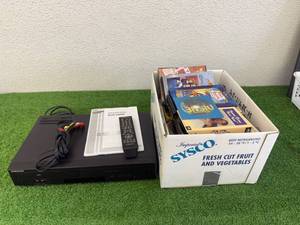 lot 125 image: DVDVCR Player & VHS Tapes