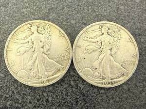 lot 148 image: 2 1935 Walking Liberty Half Dollars