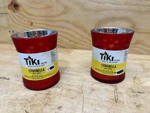 lot 240 image: TIKI Lot of 2- Americana Hurricane Glass Candle, 9-Ounce, Assorted