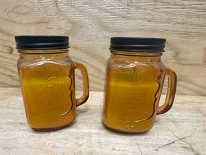 lot 242 image: Patio Essentials Lot of 2- Citronella Glass Mason Jars - Medium