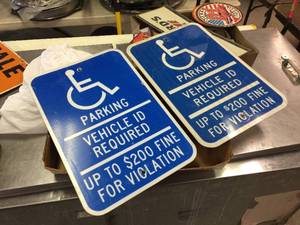 lot 118 image: 2 Reflective Handicap Parking Aluminum Signs 12 x 18
