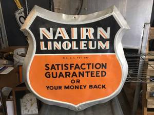 lot 202 image: Vintage Nairn Linoleum - Metal Shield Advertiser Sign 20 12 x 21 12