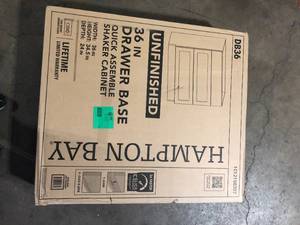 lot 12 image: Hampton Bay 36 in. W x 24 in. D x 34.5 in. H Ready to Assemble Drawer Base Kitchen Cabinet in Unfinished with CLICKREADY Technology  Customer Returns See Pictures