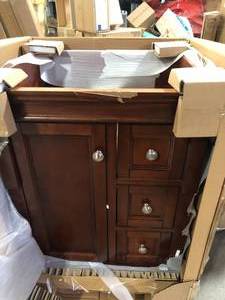 lot 39 image: Home Decorators Collection Naples 24 in. W x 21.63 in. D x 34 in. H Bath Vanity Cabinet without Top in Tobacco  Damaged   Customer Returns See Pictures