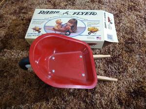 lot 26 image: Radio Flyer Doll Wheelbarrow