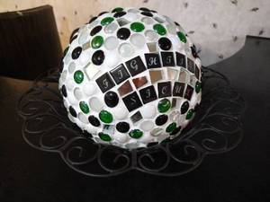 lot 128 image: Heavy Decorated Cement Ball - Fighting Sioux